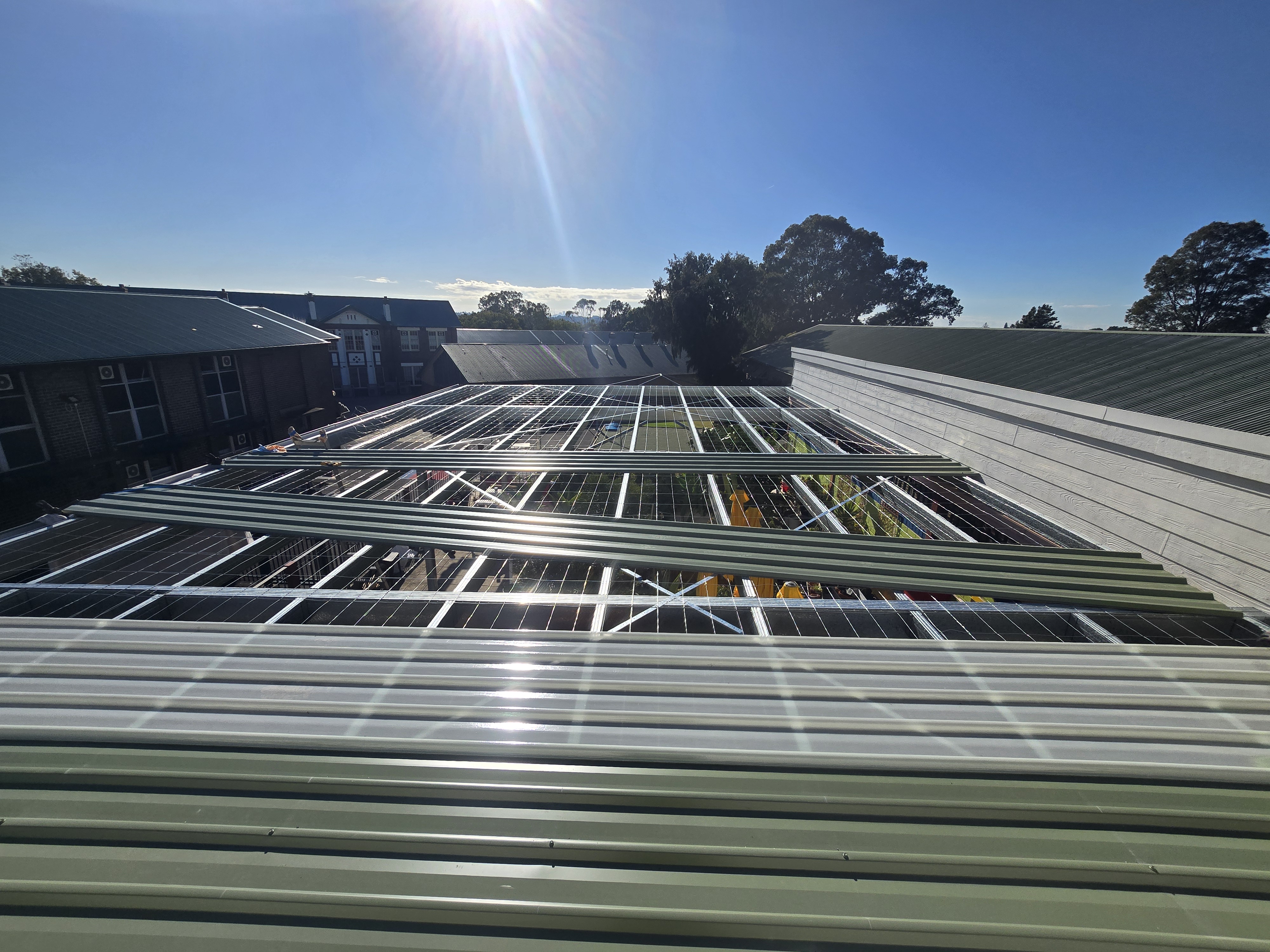 Metal roofing with solar panels